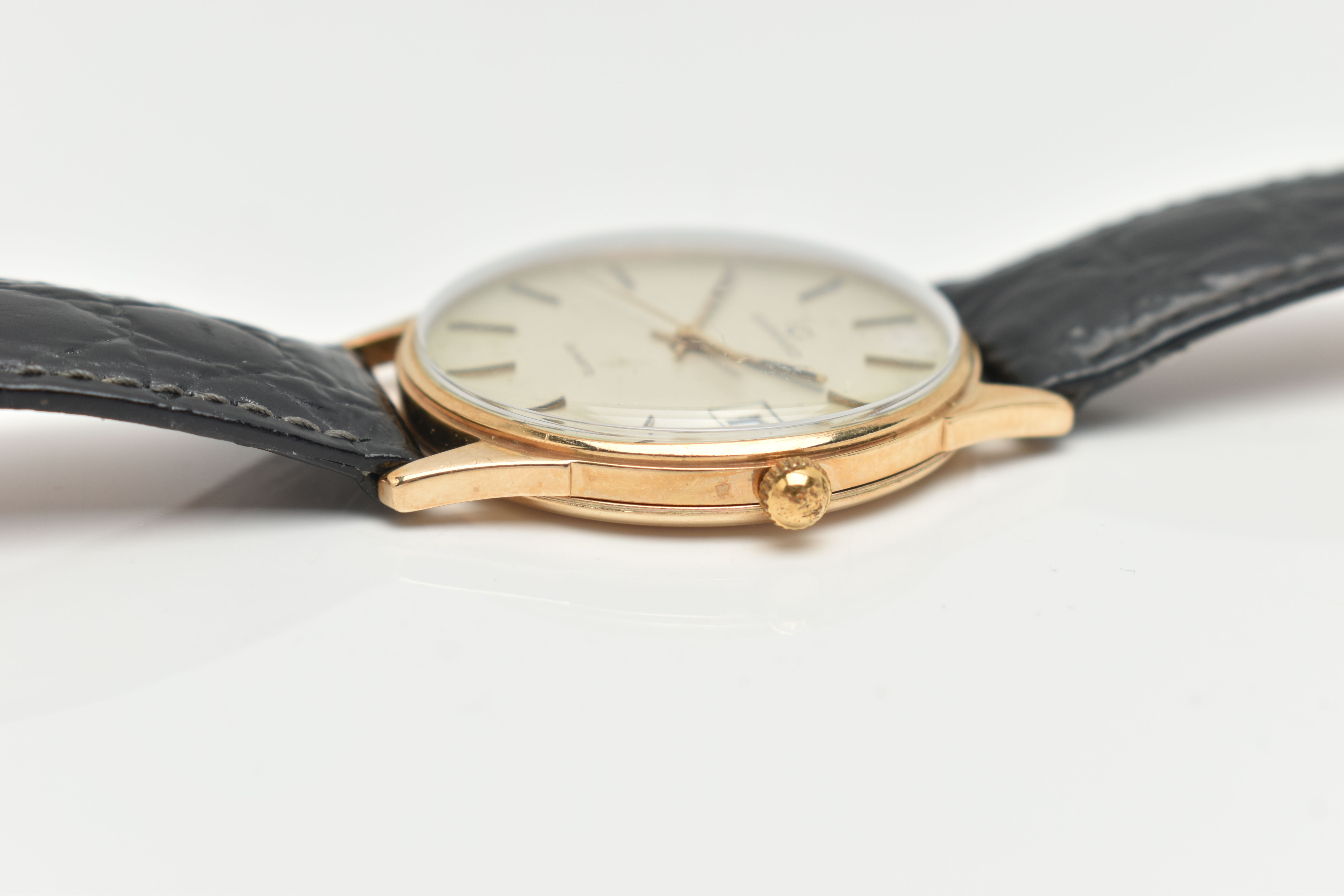 A 9CT GOLD GARRARD WRISTWATCH, with quartz movement, circular gold coloured dial signed Garrard - Image 6 of 6