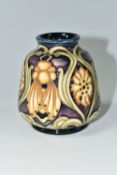 A SMALL MOORCROFT POTTERY 'QUEEN BEE' VASE, with tube lined yellow flowers, foliage and bees on a