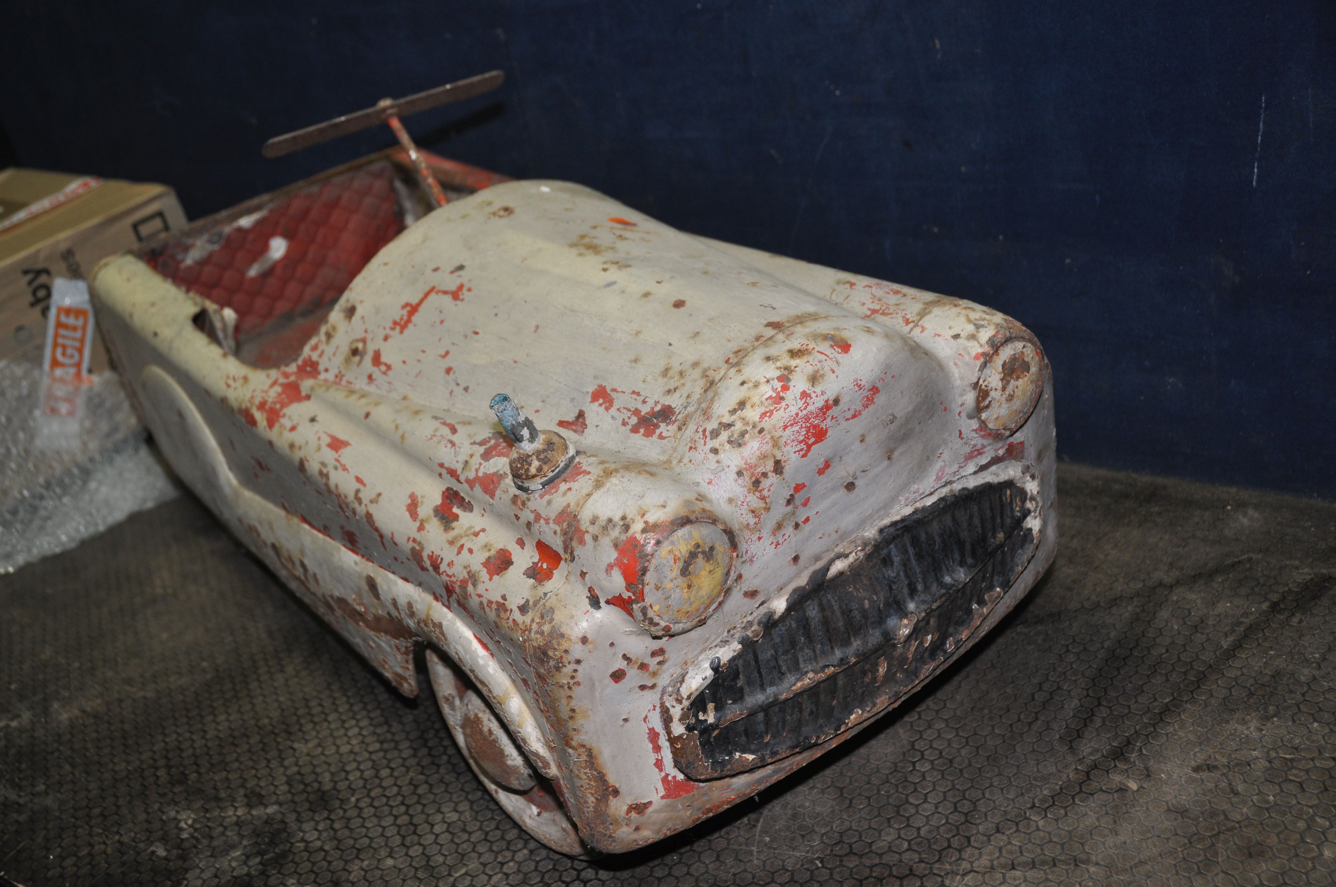 A 1950'S CHILDS TIN PLATE PEDAL CAR with distressed paint finish, total length 36in (Condition - Image 2 of 3