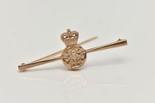 A BOXED 9CT GOLD DIAMOND SET BROOCH, depicting a Tudor rose set with a small single cut diamond,