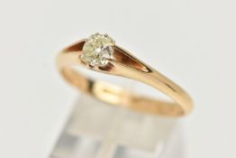A SINGLE STONE DIAMOND RING, the old mine cut diamond in an eight claw setting to the bifurcated
