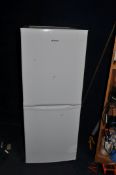 A CANDY CSC1365WEN FRIDGE FREEZER, width 55cm depth 60cm height 135cm (PAT pass and working at 0 and