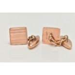 A PAIR OF 9CT GOLD CUFFLINKS, each designed as a square panel with banded decoration, to the chain