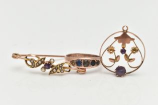 THREE EARLY 20TH CENTURY JEWELLERY ITEMS, to include an open work lavalier pendant, set with two