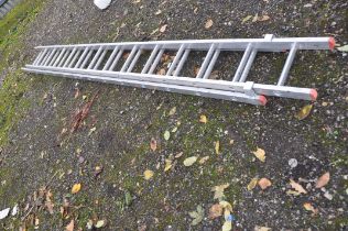 AN ALUMINIUM TITAN COMPETITION 3.5M DOUBLE EXTENSION LADDER, with 13 rungs to each length