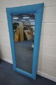 A LARGE NEXT RECTANGULAR TEAL FABRIC MIRROR, 181cm x 80cm (condition report: minor marks to frame)