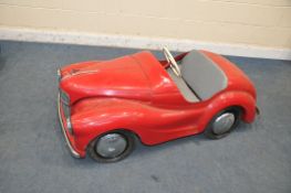 AN AUSTIN J40 CHILDREN'S PEDAL CAR, long Serial number to chassis reads 31476, length 61in, The