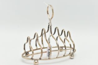 A SILVER TOAST RACK, hallmarked 'G & J Bushell & Co' Birmingham 1904, approximate gross weight 4.