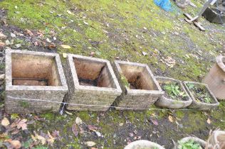 A SET OF THREE WEATHERED COMPOSITE BRICK EFFECT SQUARE PLANTERS, signed Sanford stone, 40cm x height