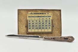 A GEORGE V SILVER MOUNTED SHAGREEN PERPETUAL DESK CALENDAR OF RECTANGULAR FORM, with seven double