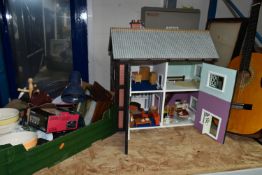 A MODERN KIT BUILT WOODEN DOLLS HOUSE, front opening to reveal four rooms over two floors,