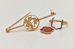 A 9CT GOLD BAR BROOCH AND A RING, the brooch displaying open work shamrocks, to a polished bar,