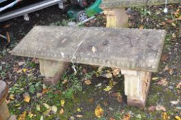 A WEATHERED COMPOSITE RECTANGULAR GARDEN BENCH, on twin scrolled supports, length 119cm depth 41cm x