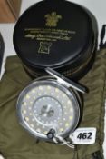 A HARDY BROTHERS LTD. FISHING REEL, with zip fastening black case and green canvas bag, a Marquis #7