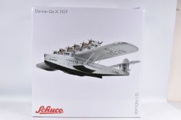 A BOXED SCHUCO DORNIER DO X 1929 1:72 SCALE DIECAST MODEL AIRCRAFT, numbered 40 355 1700, inside