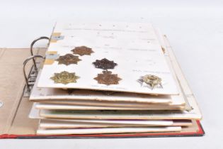 A BINDER CONTAINING VARIOUS BRITISH AND COMMONWEALTH CAP BADGES AND COLLAR BADGES, these are a mix