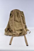 A UNITED STATED ARMY STEEL FRAMED RUCKSACK, it is khaki in colour and has U.S clearly stamped on the