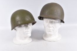 A POST WWII USA ARMY STEEL HELMET, it has its detachable plastic inner but the liner is damaged,