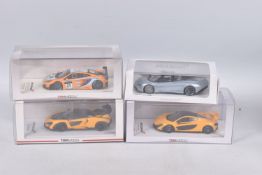 THREE BOXED TSM MODEL MCLAREN MODEL VEHICLES TOGETHER WITH ONE UNBRANDED MCLAREN MODEL, the first is