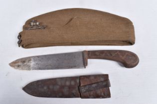 A ROYAL WARWICKSHIRE REGIMENT SIDE CAP AND A KNIFE, the side cap is khaki and has the badge and