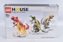 AN UNBUILT BOXED LEGO HOUSE DINOSAURS SET, numbered 40366, taped seals numbered 35O9, appears in new