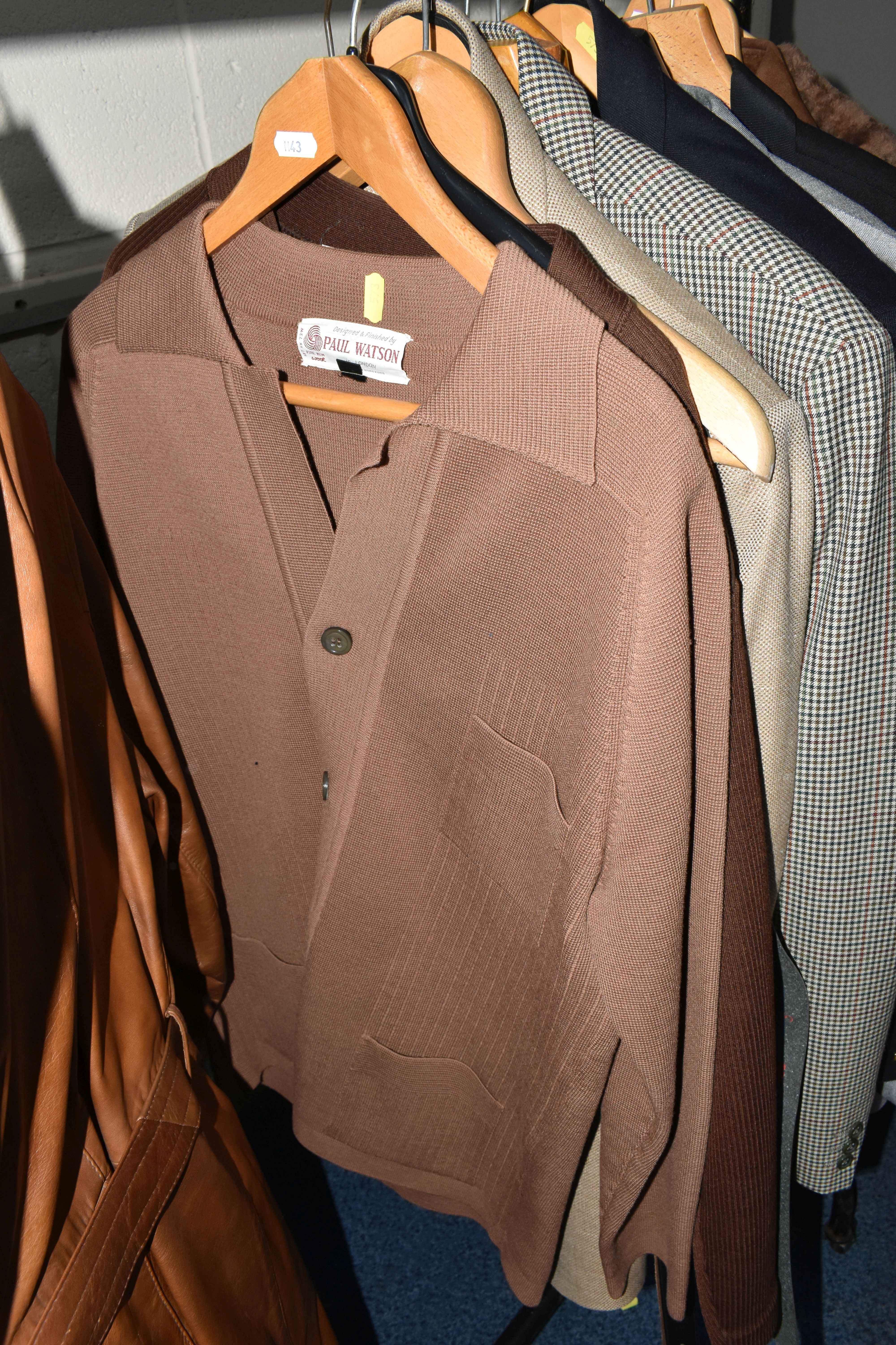 ONE RAIL OF GENTLEMEN'S VINTAGE CLOTHING, to include a navy blue Jaeger woolen shirt, a brown - Image 4 of 11