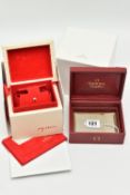TWO 'OMEGA' WATCH BOXES, the first a ladies cream textured box with red ribbon, signed 'My