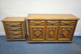 A SOLID OAK SIDEBOARD, with three drawers above three cupboard doors, length 156cm x depth 53cm x