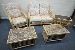 A WICKER THREE PIECE CONSERVATORY SUITE, comprising a two seater sofa, length 124cm x depth 88cm x