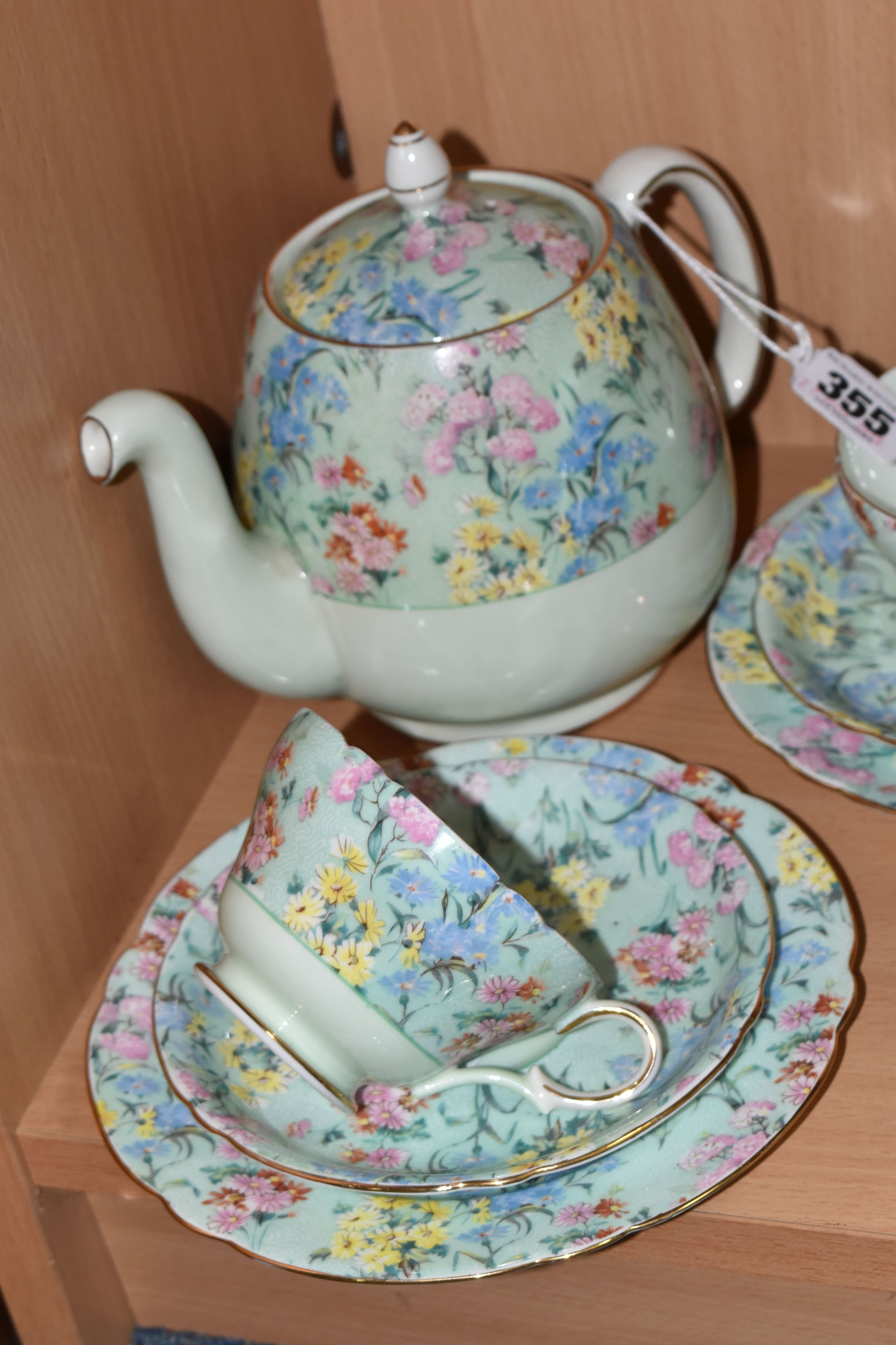 A TWENTY FIVE PIECE SHELLEY 'MELODY' TEA SET, comprising a teapot, a cake plate, a cream jug, a - Image 2 of 12