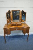 A PALATIAL BURR WALNUT DRESSING TABLE, with the two wing mirrors, flanking a central section where