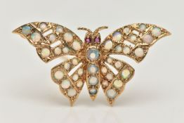 A 9CT GOLD OPAL AND RUBY BUTTERFLY BROOCH, the butterfly body and wings set with circular opal