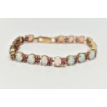 A 9CT GOLD OPAL AND RUBY BRACELET, designed as oval opal cabochons each interspaced by two