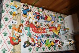 EIGHTEEN DISNEY CHRISTMAS DECORATIONS, mostly boxed, comprising Mickey Mouse, Minnie Mouse (end of