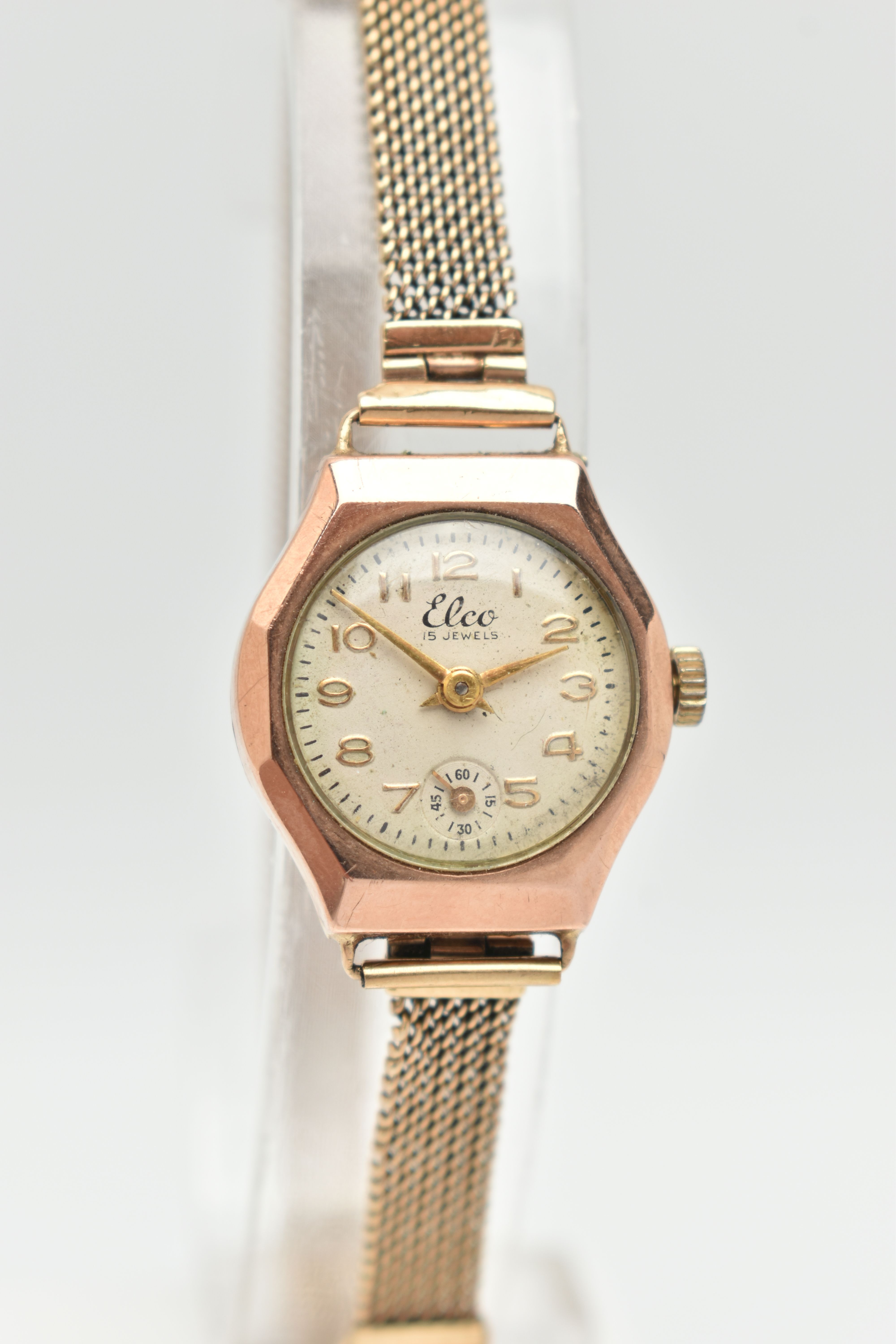 A 9CT GOLD WRISTWATCH, hand wound movement, round dial signed 'Elco' 15 jewels, Arabic numerals,