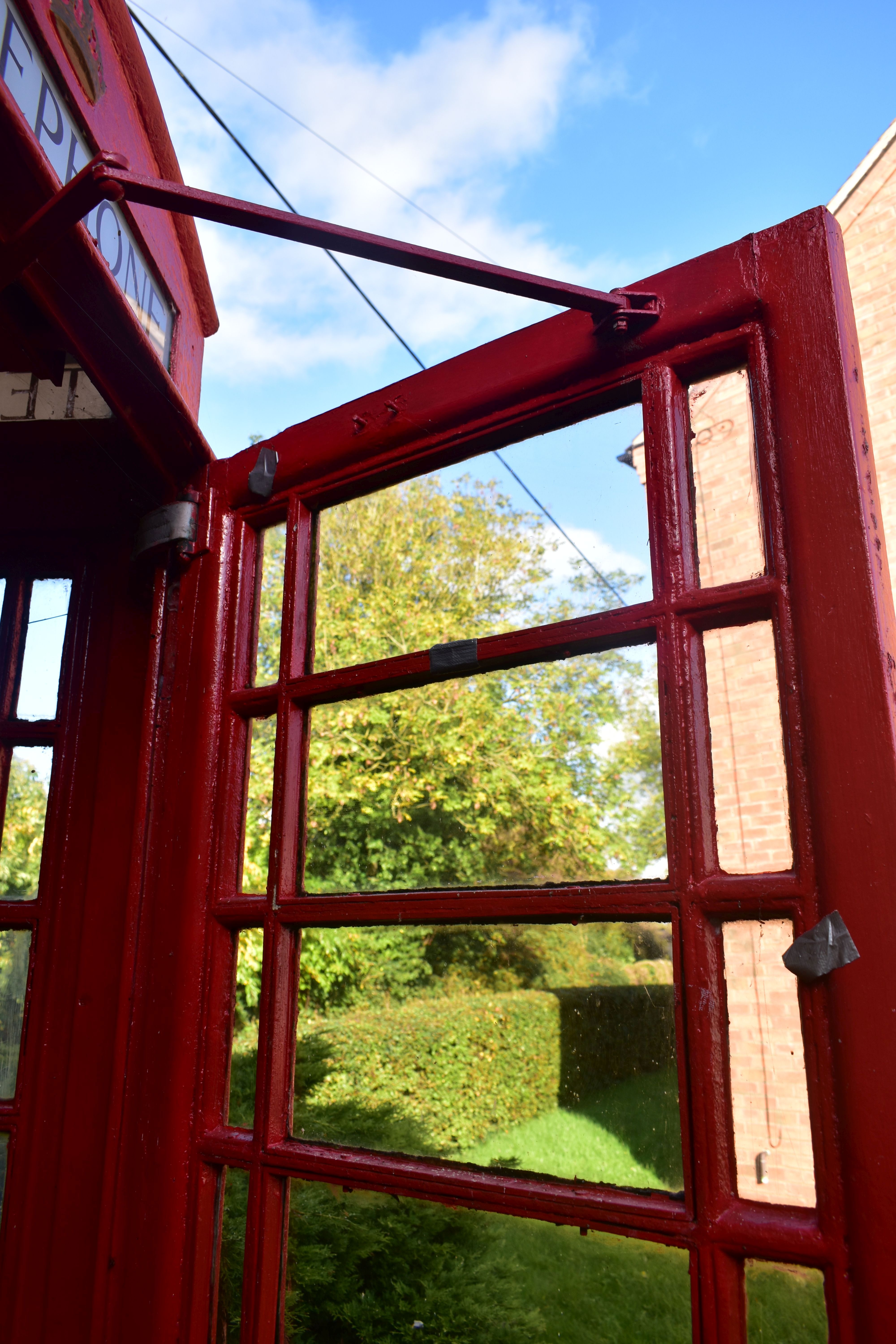 A K6 RED TELEPHONE BOX, the distinctive shape with a domed top, crown and telephone sign to all - Image 9 of 17