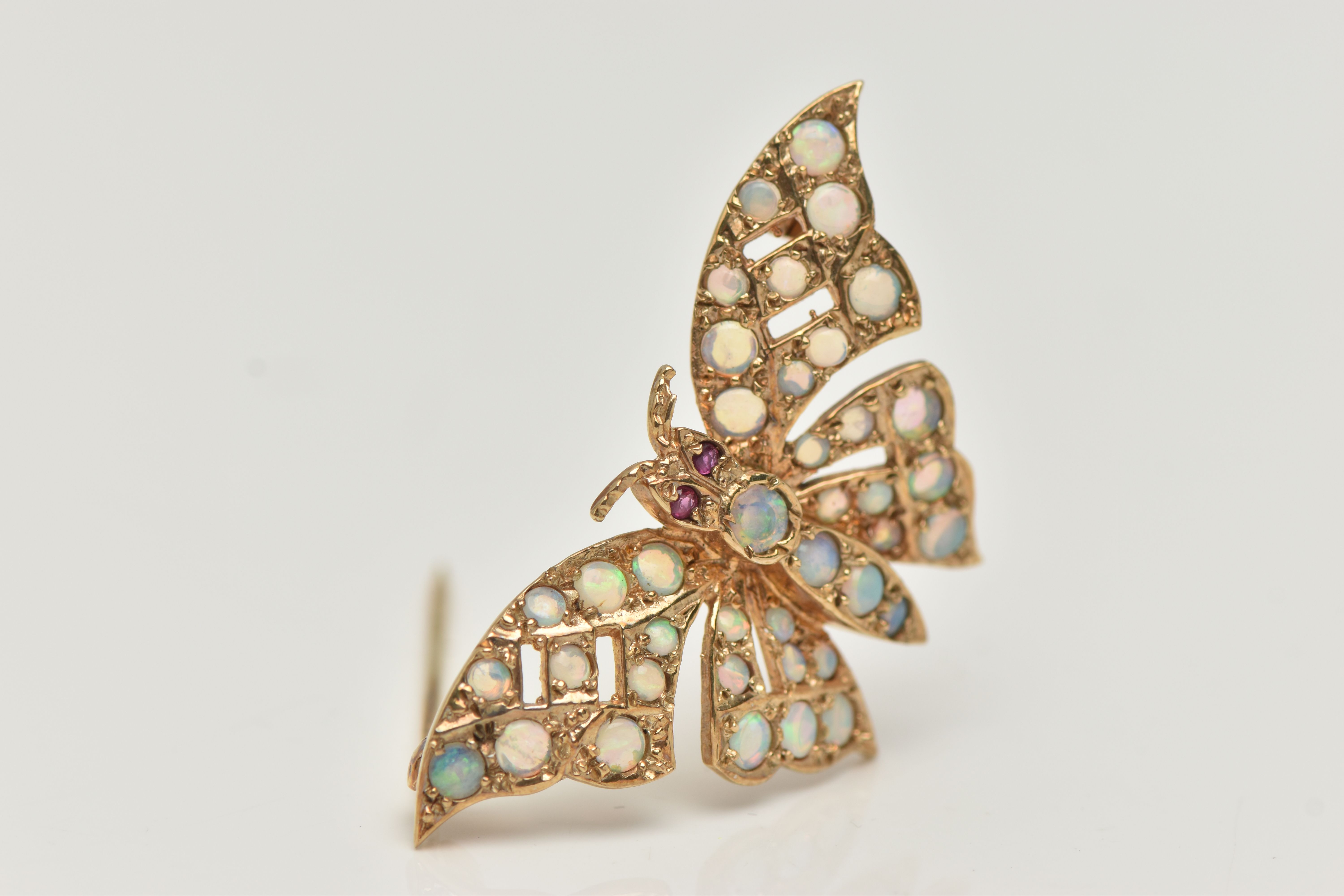 A 9CT GOLD OPAL AND RUBY BUTTERFLY BROOCH, the butterfly body and wings set with circular opal - Image 2 of 4