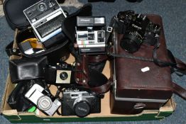 ONE BOX OF VINTAGE CAMERAS, to include a hard cased Canon A-1 1590747 camera with instruction