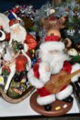 A BOXED ARTIFICIAL CHRISTMAS TREE, A BOXED CERAMIC FIGURE OF SANTA CLAUS ON A ROCKING HORSE, THREE