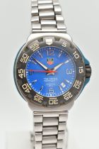 A 'TAG HEUER' FORMULA 1 WRISTWATCH, quartz movement, round blue dial signed 'Tag Heuer' Formula 1