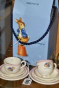 A BOXED WEDGWOOD PETER RABBIT SIX PIECE NURSERY TEA SET, comprising two cups, two saucers and two