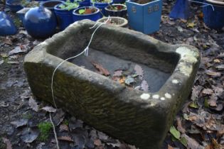 A RECTANGULAR SANDSTONE TROUGH, length 69cn x 46cm x height 30cm (condition report: one corner