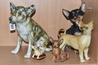 A GROUP OF CHIHUAHUA FIGURES, comprising a Winstanley Chihuahua with glass eyes and signature to the