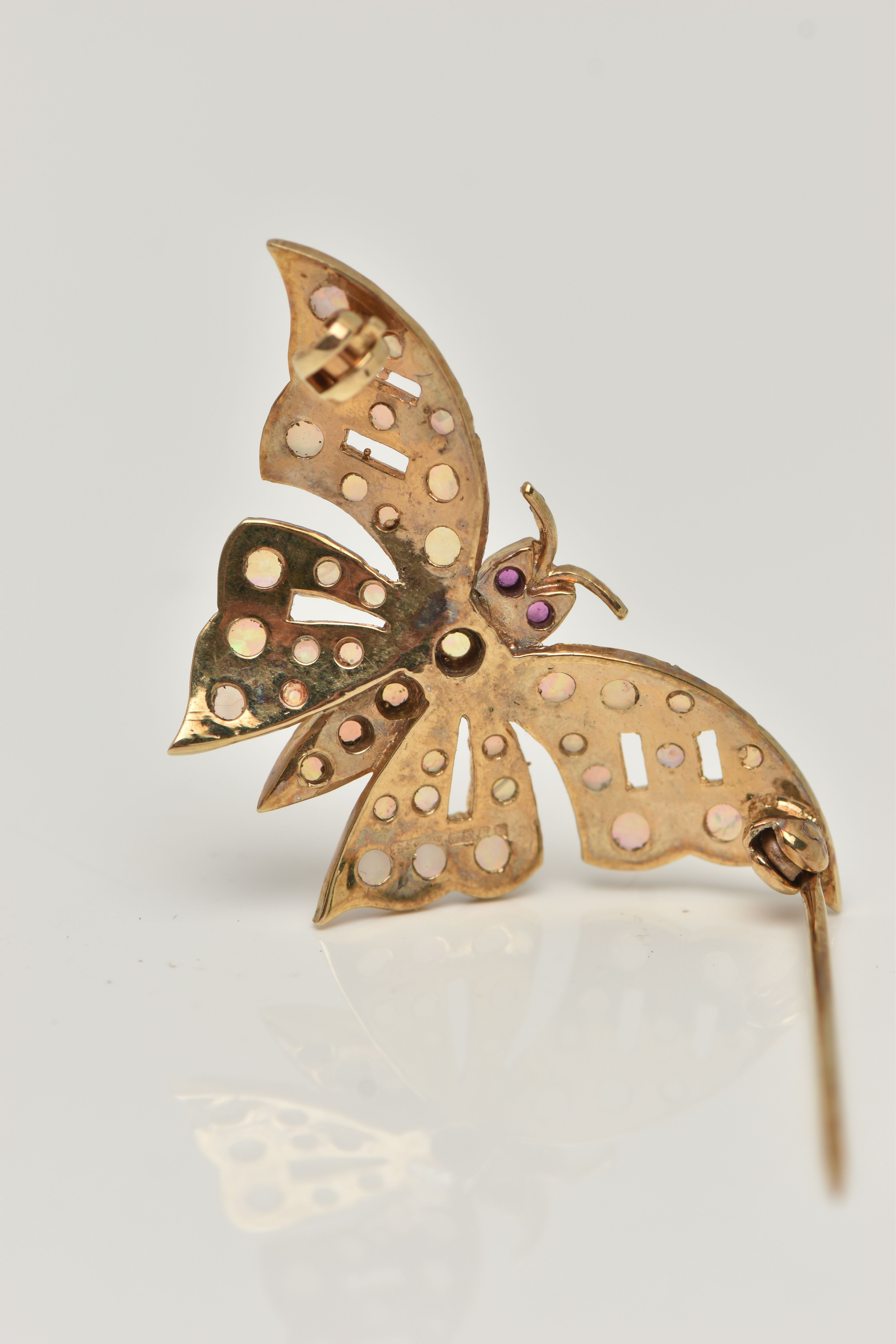 A 9CT GOLD OPAL AND RUBY BUTTERFLY BROOCH, the butterfly body and wings set with circular opal - Image 4 of 4