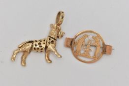 A PENDANT AND A BROOCH, the pendant designed as an articulated dog, with 9ct hallmark, the brooch of