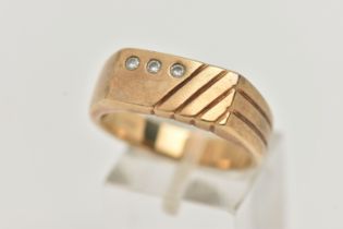 A GENTS 9CT GOLD DIAMOND SIGNET RING, rectangular signet set with three small, round brilliant cut
