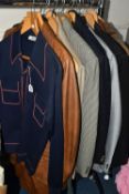 ONE RAIL OF GENTLEMEN'S VINTAGE CLOTHING, to include a navy blue Jaeger woolen shirt, a brown
