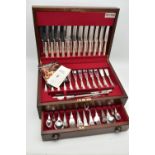 A 'BUTLER' CANTEEN, twelve person place setting of kings pattern cutlery, including meat carving
