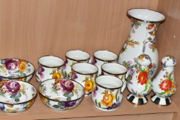 A COLLECTION OF MACKENZIE-CHILDS 'FLOWER MARKET' DESIGN MUGS, hand decorated enamelware with