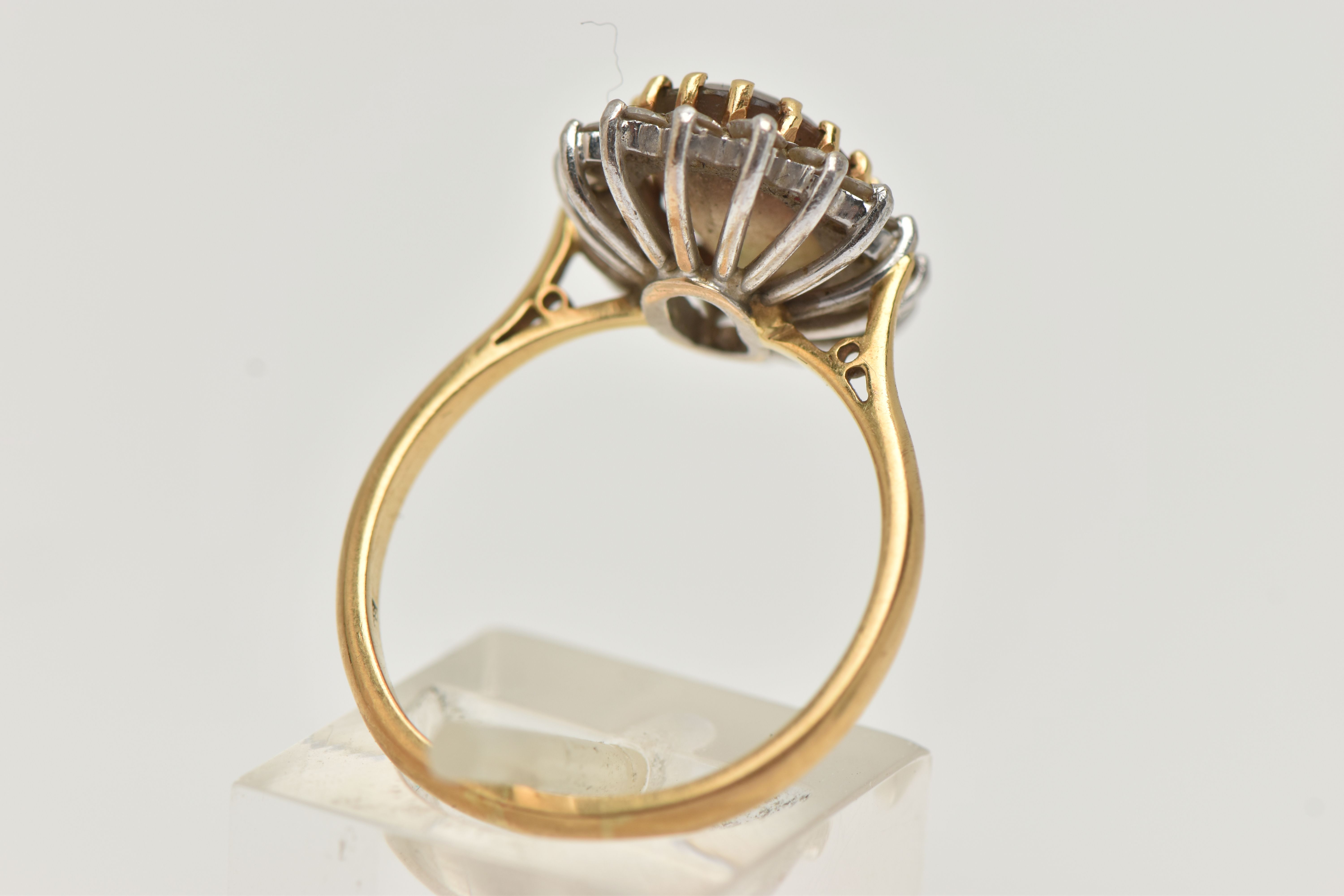 AN 18CT GOLD SMOKY QUARTZ AND DIAMOND CLUSTER RING, the oval smoky quartz within a brilliant cut - Image 3 of 4